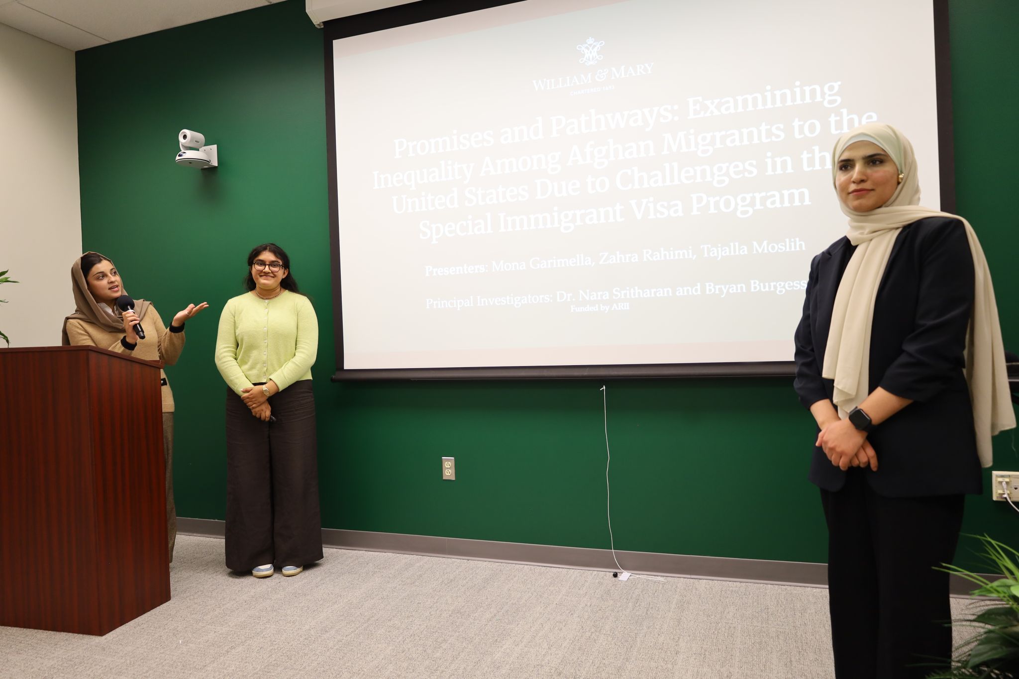 Promises and Pathways students present at a GRI event. 