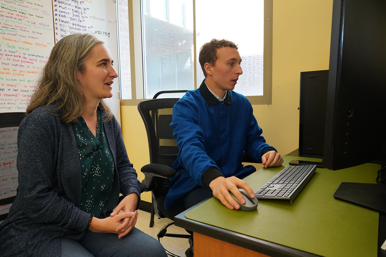 Isabelle Taylor works with a student.
