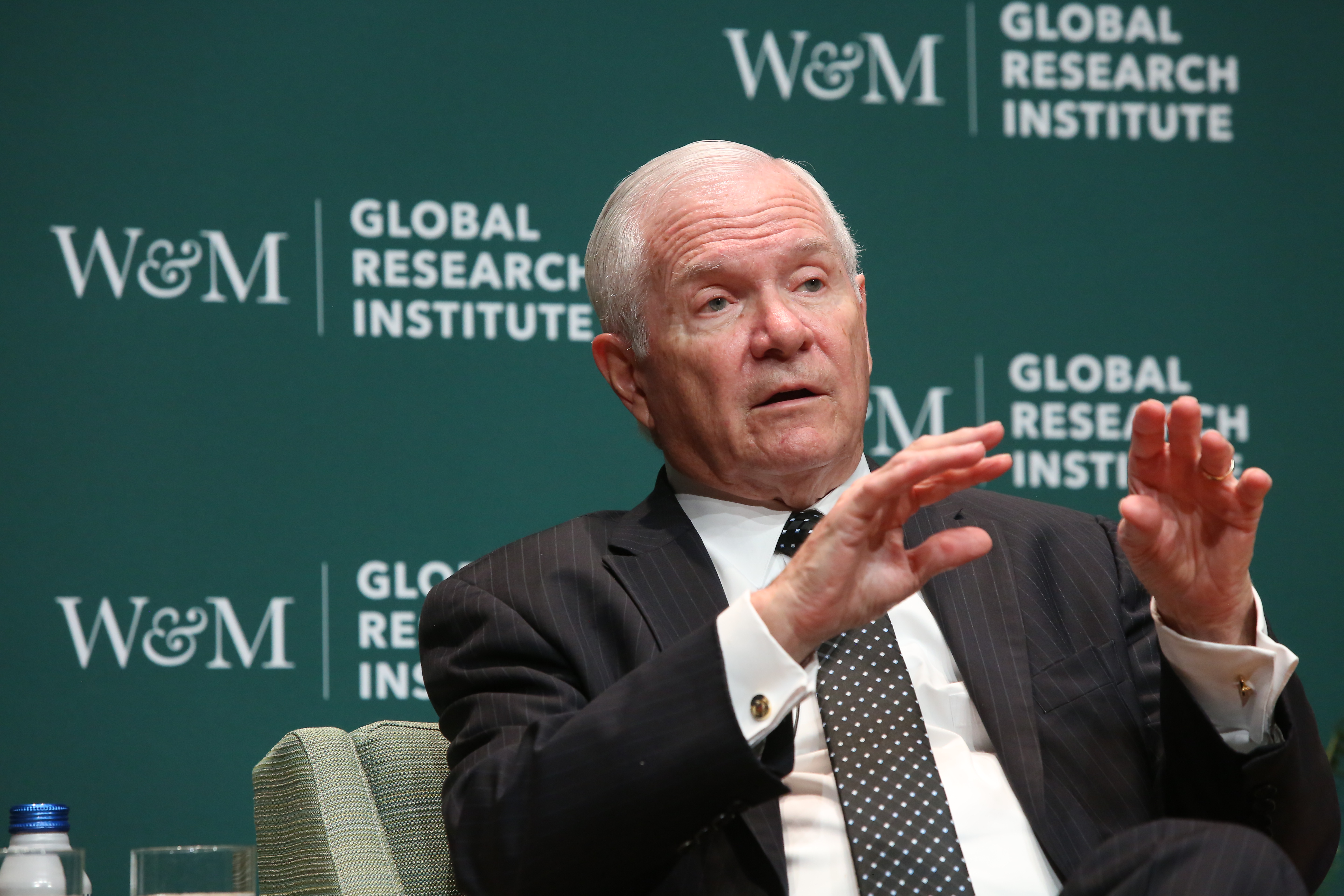 Gates speaks at a Forum keynote. 