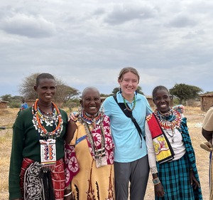 Riley Kelley'24 with Maasai women in Kenya