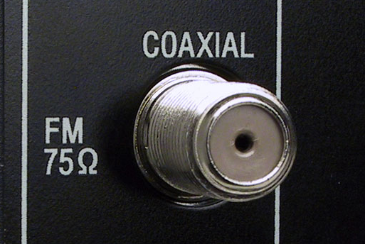If your television has a coax connector like this, it has a tuner - but make sure the tuner includes QAM/ATSC!