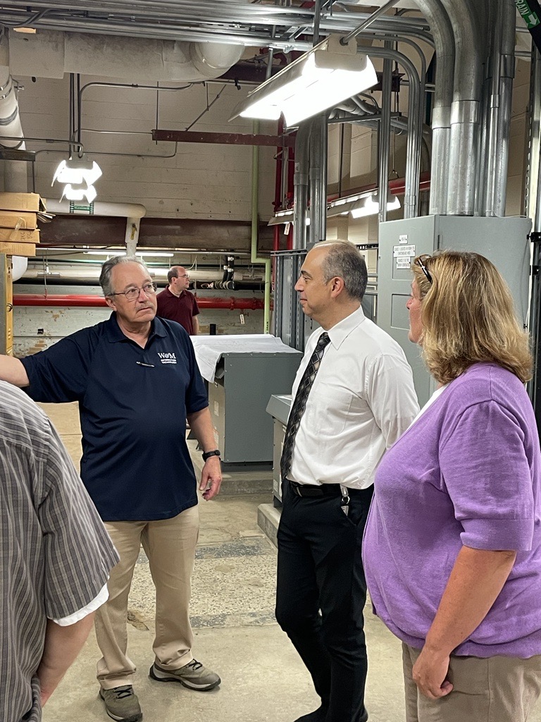 Dave Shantz, infrastructure projects manager, gives CIO Ed Aractingi and Director of Systems Integration and Automation Kathy Baldwin a tour of the Blow Data Center.