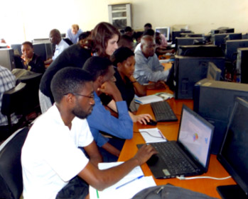 Justin DeShazor and Rebecca Schectman lead a GIS training at Makerere University, Uganda