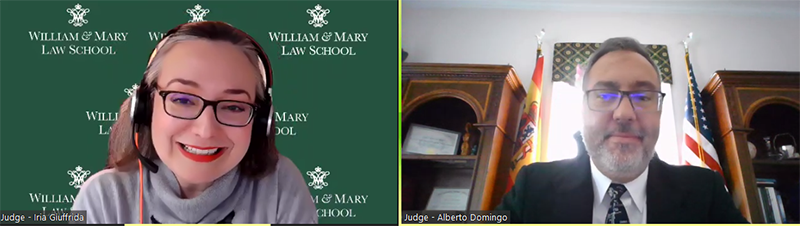 Judges Prof. Iria Giuffrida (W&M Law) and Dr. Alberto Domingo (NATO) confer.