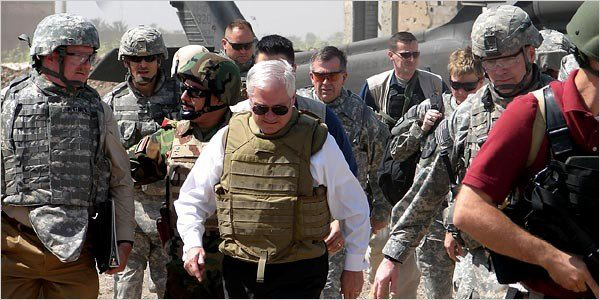Ambassador Whitaker (left) with Secretary Gates in Iraq. (Courtesy photo)