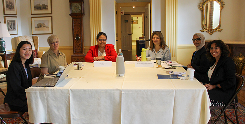 A welcome in the Reves Room. L-R: Grace Klauer, Program Director, Presidential Precinct;  Teresa Longo; Hala Doma; Rana Raad; Amal Mahmoud Mohamed Ahmed; and Nesma Elsayed Ellbalboushy Mohamed. (Photo: Kate Hoving)