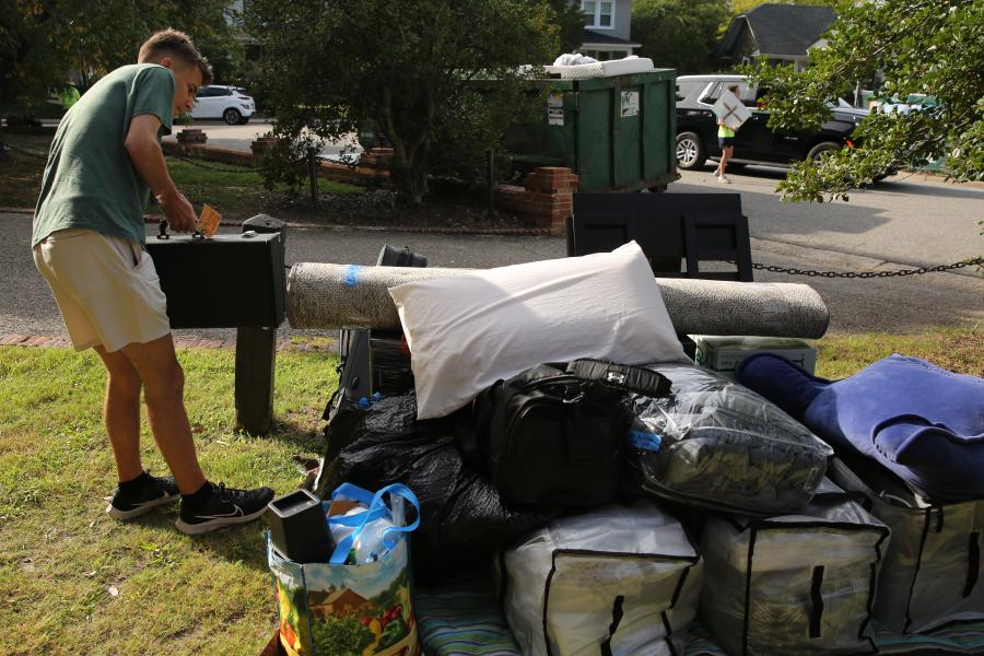 Family members and friends helped new students move into their residence halls.