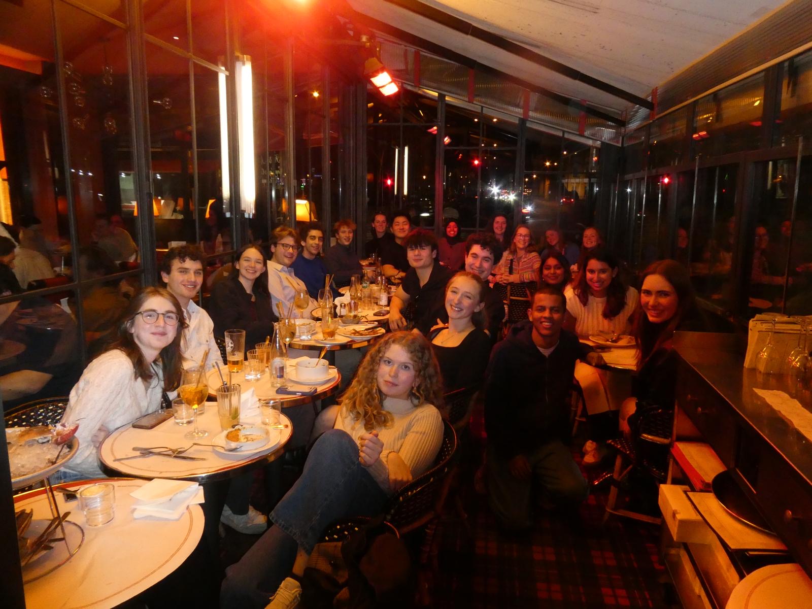 Students gather to enjoy dinner after exploring the city. (Photo courtesy of Nina Appicello ‘26) 