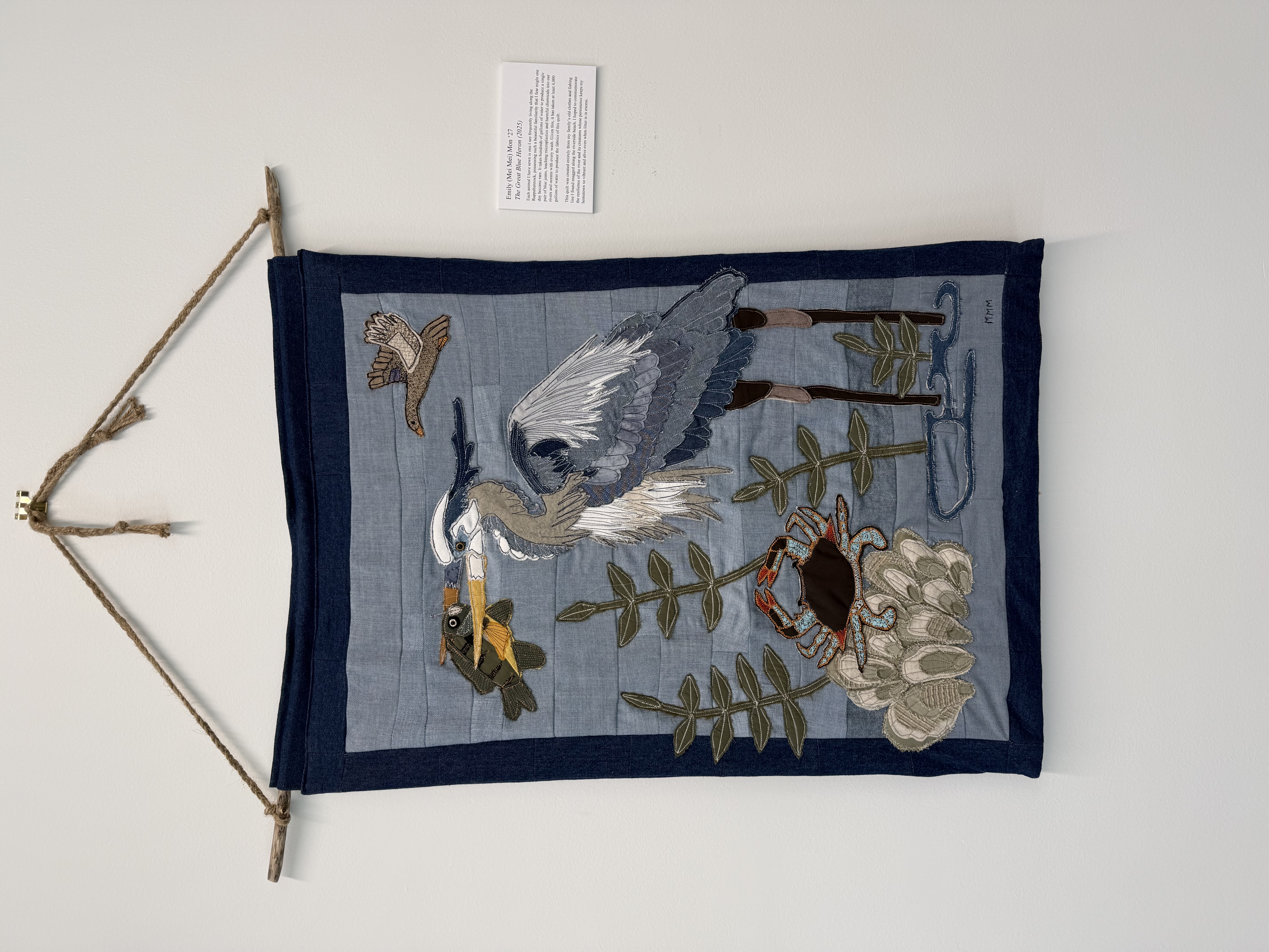 The Great Blue Heron, a sewn hanging made by Emily (Mei Mei) Mon ‘27 pays tribute to the animal life by her local river and calls attention to the waste that impacts their home. (Photo courtesy of Rebecca Graber ‘27) 