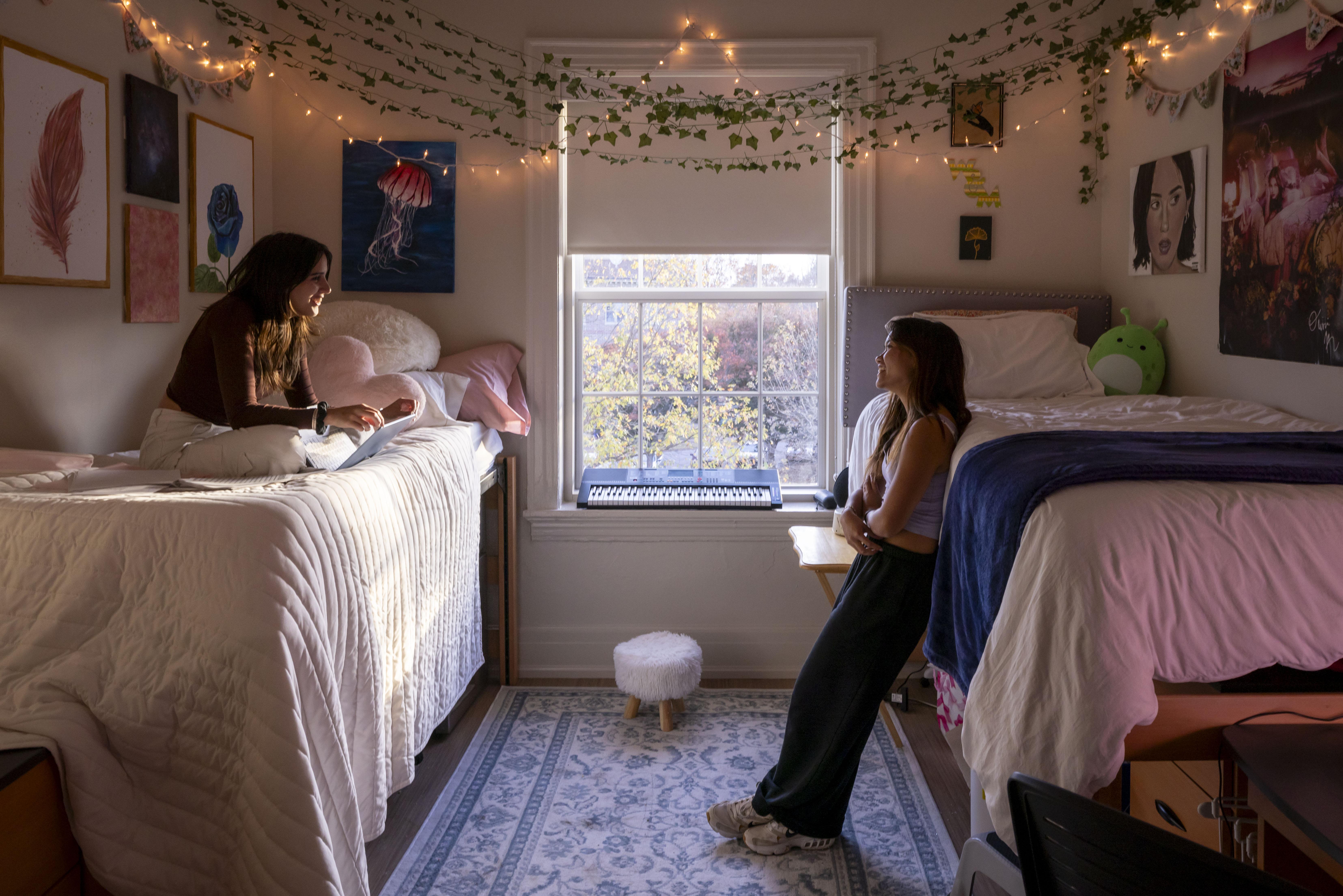 Students spend time together in a room in Monroe Hall. For many William & Mary students, shared living spaces become an important part of their college experience.