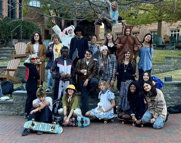 Skate Club joined together on Halloween to hand out candy to students and residents. (Photo courtesy of Izzy Anderson) 