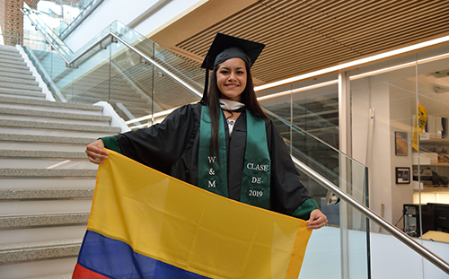 A student celebrates at the LatinX graduation ceremony.