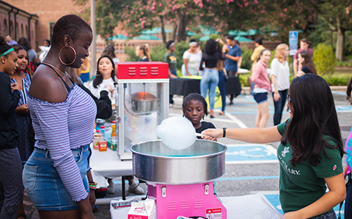 Students enjoy some cotton candy at the CSD Block Party