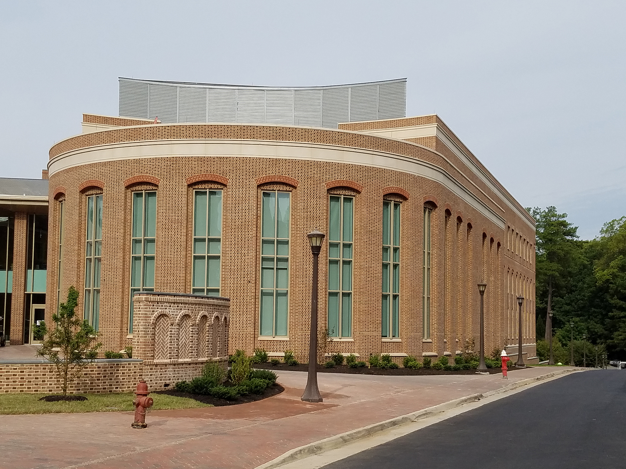 Integrated Science Center 3 seen from the road, showing the outside of a round lecture room