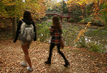 Students walk by Crim Dell