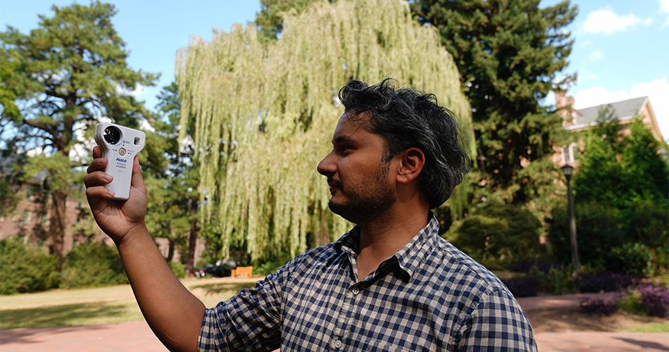 Dom Ciruzzi, a William & Mary professor in the geology department, researches the swaying of trees.