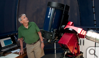 Bob Vold, director of the astronomical observatory, puts the observatory’s new computer-controlled dome, telescope and mount through its paces. 