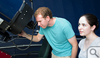Jacob Gunnarson and Alexandra Cramer using the Meade telescope 