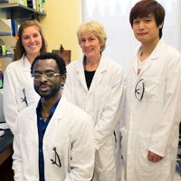 Sara Schad ’16, Cyril Anyetei-Anum ’16, Chancellor Professor of Biology Lizabeth Allison and M.S. student Dylan Zhang