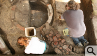 WMCAR archaeologists Lauran Kellam and Jack Aube work around a well dug by thirsty Union occupiers. 