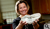 Rowan Lockwood displays a large fossil oyster. 