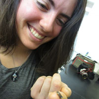Anna Klompen ’17 balances an adult flatworm on her finger