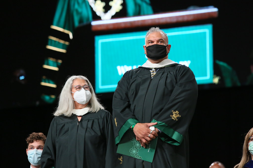 Chief Lynette Allston of the Nottoway Indian Tribe of Virginia and Chief Keith Anderson of the Nansemond Indian Nation with American Indian Student Association President Indian Matthew Solomon ’24 at Charter Day 2022. Photo by Stephen Salpukas.