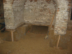 Excavation beneath foundation walls in the Brafferton's cellar