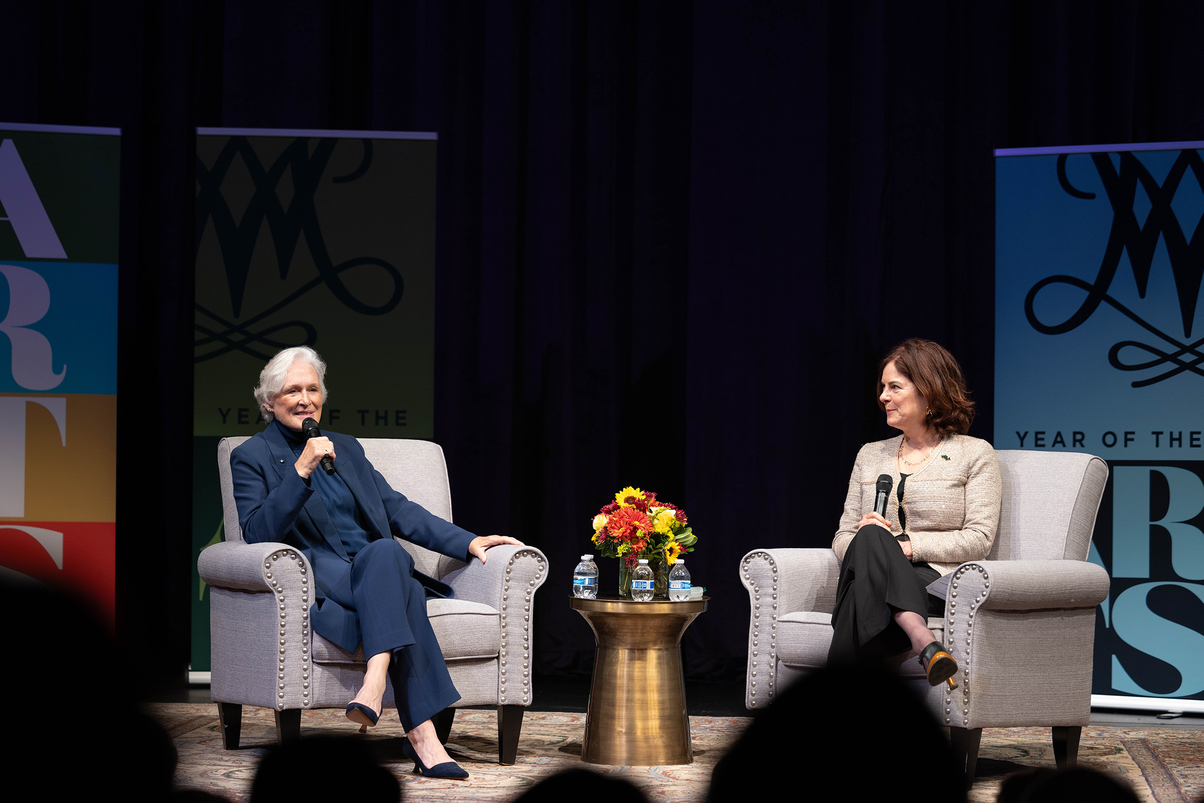 Glenn Close and President Rowe converse