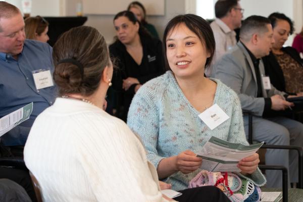 Participants engage in conversation during a leadership development event at William &amp; Mary.