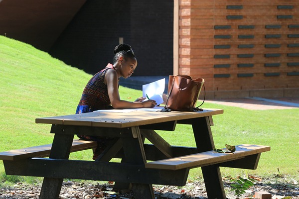 paperwork_on_bench_outside