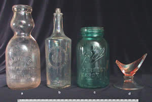 Along with the milk and sauce bottles (a, b) are a Ball canning jar and a broken sherbet cup.