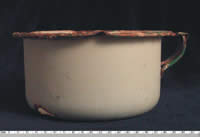 an enamel chamber pot