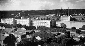 View of Dan River Mills' Riverside Division in 1941. The Front Street neighborhood would be located on the far side of the river, just east (right) of the area shown in this photograph. (from Hagan 1950:between 54-55)