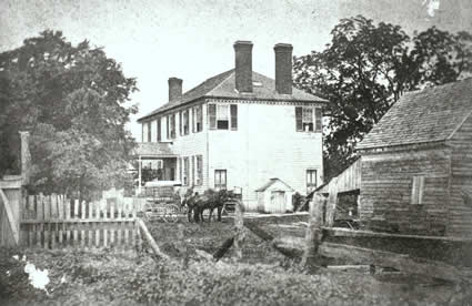 We were thrilled to find this 1870s photograph of Weston at the Virginia Historical Society, confirming expectations of outbuildings on the grounds. Besides the large structure in the foreground, the gable of another appears faintly through the porch, on the far side of the mansion. According to architectural historian Susan Horner, the style of the structure suggests it is contemporary with the late eighteenth-century mansion. Located on the same side of the house as the dining room and the bulkhead entrance to the service space in the cellar, the outbuilding originally may have served as a kitchen. Though the cropping of the photograph obscures a possible chimney—obviously essential for a kitchen—archaeologists did find brick rubble in this general area of the yard. (Fred Bell negatives, Virginia Historical Society)
