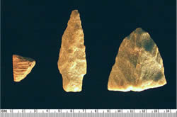 Excavations continued to document prehistoric Native American presence on the property. Notable artifacts (left to right) include cord-marked pottery (500 BC to AD 1600), a projectile point (3000 to 1200 BC), and an undated stone bifacial tool (sharpened on both sides).