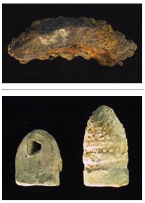 Obvious signs of Civil War military activity include a 4-inch-wide cannon ball fragment (top), .56 caliber minié bullet (above right), and a carved bullet (above left). Soldiers often whittled bullets while relaxing in camp.
