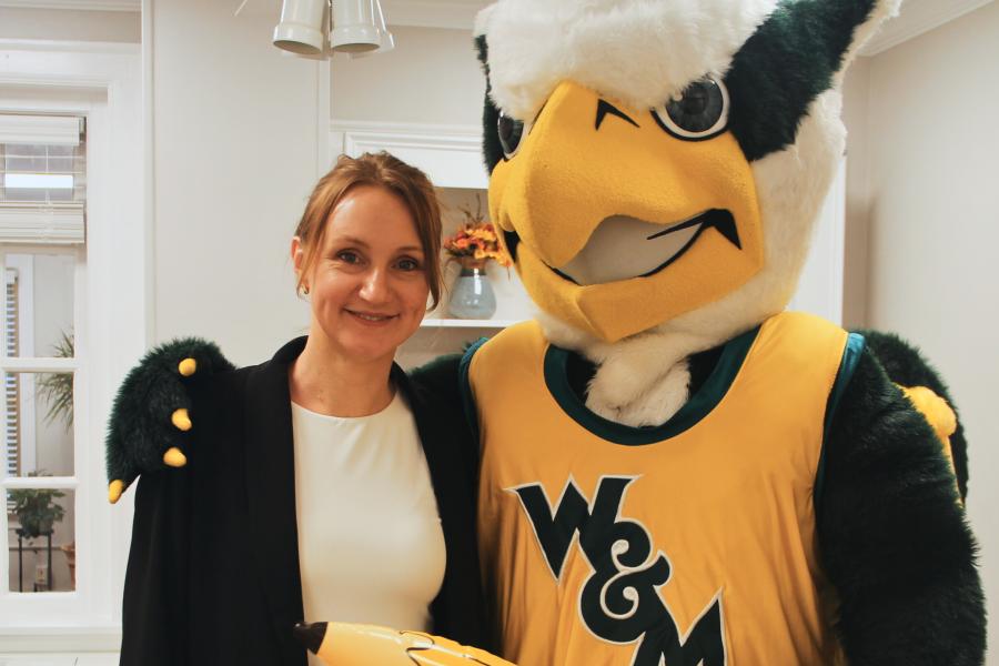 Griffin mascot poses with a Workday Project team member to celebrate the Pencil's Down milestone