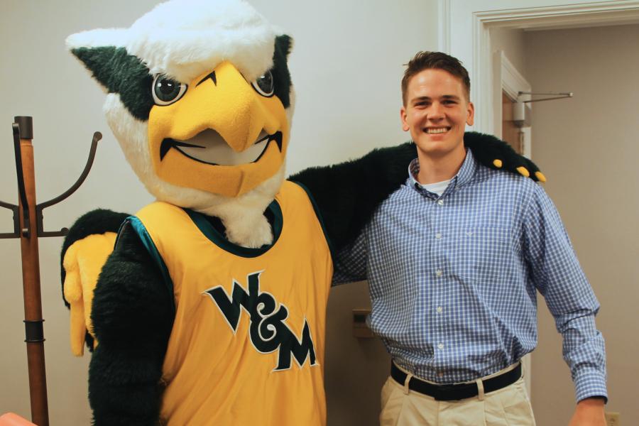 Griffin mascot poses with a Workday Project team member to celebrate the Pencil's Down milestone