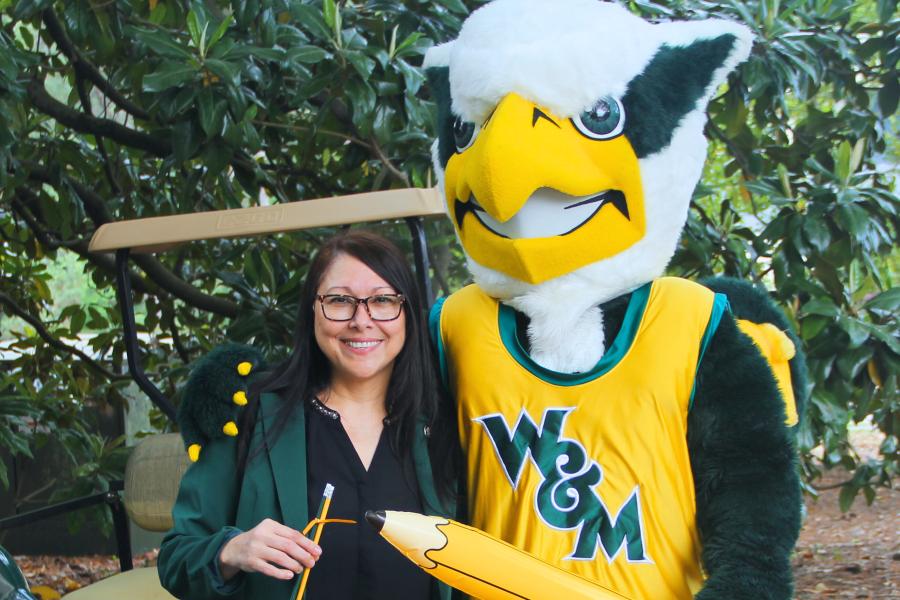 Griffin mascot poses with a Workday Project team member to celebrate the Pencil's Down milestone