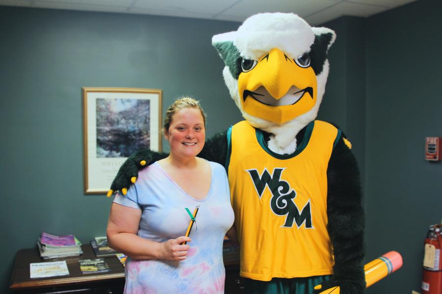 Griffin mascot poses with a Workday Project team member to celebrate the Pencil's Down milestone
